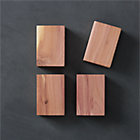 Set of four lavender cedar blocks.