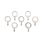 Set of seven matte nickel rings with clips.