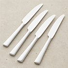 Set of four Mix dinner knives. 9.5"