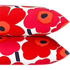 Set of two standard marimekko pieni unikko pillowcases.