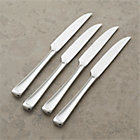 Set of four Scoop steak knives. 9.75"