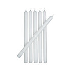 Set of six white taper candles.
