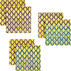Set of six trellis yellow cocktail napkins.